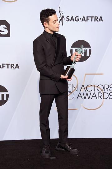 LOS ANGELES, CA - JANUARY 27:  Rami Malek poses in the press room with award for Outstanding Performance by a Male Actor in a Leading Role in 'Bohemian Rhapsody' during the 25th Annual Screen Actors Guild Awards at The Shrine Auditorium on January 27, 2019 in Los Angeles, California. 480645  (Photo by Gregg DeGuire/Getty Images for Turner)