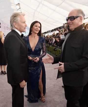 LOS ANGELES, CA - JANUARY 27: (L-R) Michael Douglas, Catherine Zeta-Jones and Andrew Dice Clay attend the 25th Annual Screen Actors Guild Awards at The Shrine Auditorium on January 27, 2019 in Los Angeles, California.  (Photo by Presley Ann/Getty Images)