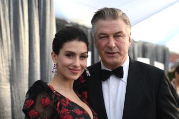 Actor Alec Baldwin (R) and wife Hilaria Baldwin walk the red carpet at the 25th Annual Screen Actors Guild Awards at the Shrine Auditorium in Los Angeles on January 27, 2019. (Photo by Robyn Beck / AFP)        (Photo credit should read ROBYN BECK/AFP/Getty Images)