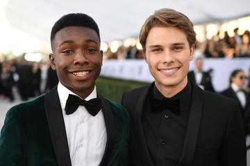 Actor Niles Fitch (L) and Actor Logan Shroyer walk the red carpet at the 25th Annual Screen Actors Guild Awards at the Shrine Auditorium in Los Angeles on January 27, 2019. (Photo by Robyn Beck / AFP)        (Photo credit should read ROBYN BECK/AFP/Getty Images)