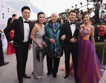 LOS ANGELES, CA - JANUARY 27:  (L-R) Jon M. Chu, Tan Kheng Hua, Lisa Lu, Ronny Chieng, and Fiona Xie attend the 25th Annual Screen Actors Guild Awards at The Shrine Auditorium on January 27, 2019 in Los Angeles, California.  (Photo by Presley Ann/Getty Images)