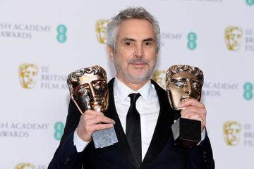 LONDON, ENGLAND - FEBRUARY 10:  Winner of the Best Director and Best Film awards for Roma, director Alfonso Cuaron poses in the press room during the EE British Academy Film Awards at Royal Albert Hall on February 10, 2019 in London, England. (Photo by Pascal Le Segretain/Getty Images)