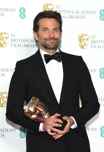 LONDON, ENGLAND - FEBRUARY 10:  Winner of the Original Music award for A Star Is Born, Bradley Cooper poses in the press room during the EE British Academy Film Awards at Royal Albert Hall on February 10, 2019 in London, England. (Photo by Pascal Le Segretain/Getty Images)