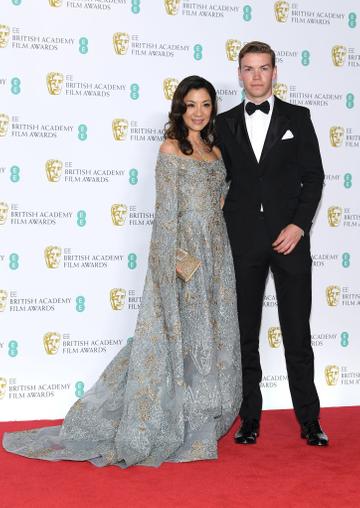 LONDON, ENGLAND - FEBRUARY 10:  Michelle Yeoh (L) and Will Poulter  pose in the press room during the EE British Academy Film Awards at Royal Albert Hall on February 10, 2019 in London, England. (Photo by Pascal Le Segretain/Getty Images)