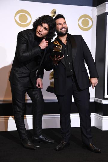 LOS ANGELES, CALIFORNIA - FEBRUARY 10: Dan Smyers (L) and Shay Mooney of Dan + Shay, winners of Best Country Duo/Group Performance for 'Tequila,' pose in the press room during the 61st Annual GRAMMY Awards at Staples Center on February 10, 2019 in Los Angeles, California. (Photo by Amanda Edwards/Getty Images)