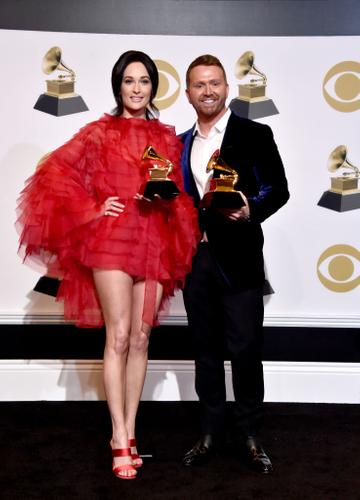 LOS ANGELES, CA - FEBRUARY 10:  Kacey Musgraves (L) and Shane McAnally, winners of the Best Country Song award for 'Space Cowboy, pose in the press room during the 61st Annual GRAMMY Awards at Staples Center on February 10, 2019 in Los Angeles, California.  (Photo by Alberto E. Rodriguez/Getty Images for The Recording Academy)
