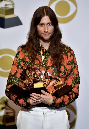 Sweedish composer Ludwig Goransson poses with the award for Record Of The Year "This Is America" (by Childish Gambino), for Song of the Year (This is America) and Best Score Soundtrack (Black Panther) in the press room during the 61st Annual Grammy Awards on February 10, 2019, in Los Angeles. (Photo by FREDERIC J. BROWN / AFP)        (Photo credit should read FREDERIC J. BROWN/AFP/Getty Images)