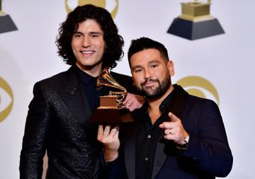 Dan Smyers and Shay Mooney of musical duo Dan + Shay pose with their award for best country duo/group performance in the press room during the 61st Annual Grammy Awards on February 10, 2019, in Los Angeles. (Photo by Frederic J. BROWN / AFP)        (Photo credit should read FREDERIC J. BROWN/AFP/Getty Images)