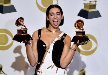 TOPSHOT - Singer Dua Lipa poses with her awards for Best New Artist and Best Dance Recording "Electricity" in the press room during the 61st Annual Grammy Awards on February 10, 2019, in Los Angeles. (Photo by FREDERIC J. BROWN / AFP)        (Photo credit should read FREDERIC J. BROWN/AFP/Getty Images)