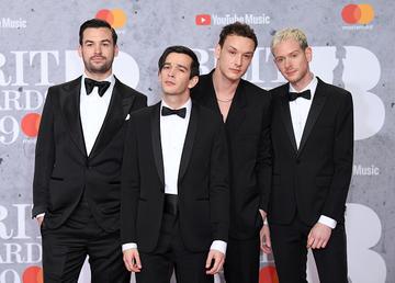 Ross MacDonald, Matthew Healy, George Daniel and Adam Hann of The 1975 attend The BRIT Awards 2019 held at The O2 Arena on February 20, 2019 in London. (Photo by: WireImage)