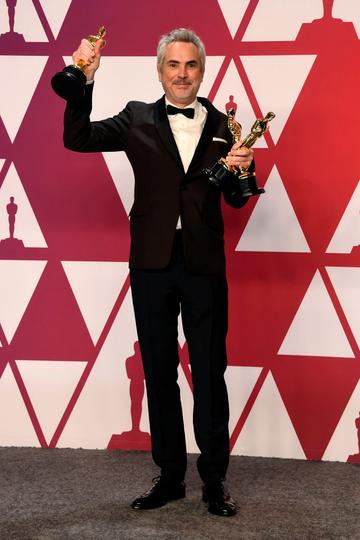 HOLLYWOOD, CALIFORNIA - FEBRUARY 24: Alfonso Cuaron, winner of Best Foreign Language Film, Best Director and Best Cinematography for "Roma," poses in the press room during the 91st Annual Academy Awards at Hollywood and Highland on February 24, 2019 in Hollywood, California. (Photo by Frazer Harrison/Getty Images)