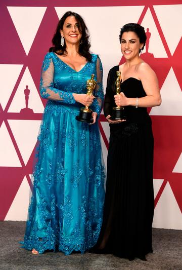 HOLLYWOOD, CALIFORNIA - FEBRUARY 24: (L-R) Melissa Berton and Rayka Zehtabchi, winners of Best Documentary Short Subject for "Period. End of Sentence.," pose in the press room during the 91st Annual Academy Awards at Hollywood and Highland on February 24, 2019 in Hollywood, California. (Photo by Frazer Harrison/Getty Images)