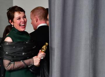Best Actress winner for "The Favourite" Olivia Colman looks on in the press room with their Oscars during the 91st Annual Academy Awards at the Dolby Theatre in Hollywood, California on February 24, 2019. (Photo by FREDERIC J. BROWN / AFP)        (Photo credit should read FREDERIC J. BROWN/AFP/Getty Images)