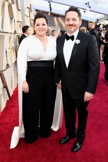 (L-R) Melissa McCarthy and Ben Falcone attend the 91st Annual Academy Awards on February 24, 2019 in Hollywood, California. (Photo by Kevork Djansezian/Getty Images)