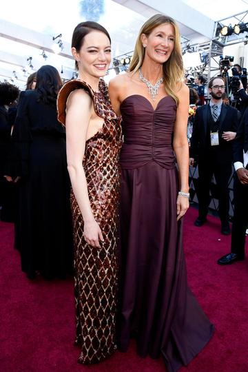 (L-R) Emma Stone and Laura Dern attend the 91st Annual Academy Awards on February 24, 2019 in Hollywood, California. (Photo by Kevork Djansezian/Getty Images)