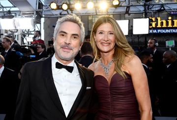 Director Alfonso Cuaron and Laura Dern attend the 91st Annual Academy Awards on February 24, 2019 in Hollywood, California. (Photo by Kevork Djansezian/Getty Images)