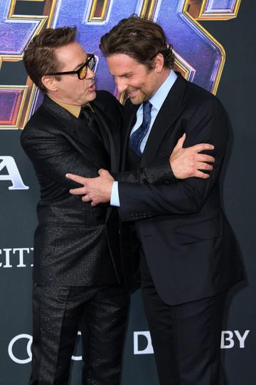 US actors Robert Downey Jr. (L) and Bradley Cooper arrive for the World premiere of Marvel Studios' "Avengers: Endgame" at the Los Angeles Convention Center on April 22, 2019 in Los Angeles. (Photo by VALERIE MACON/AFP/Getty Images)