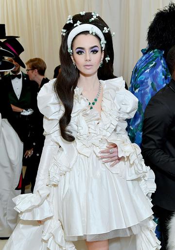 Lily Collins attends The 2019 Met Gala Celebrating Camp: Notes on Fashion at Metropolitan Museum of Art on May 06, 2019 in New York City. (Photo by Mike Coppola/MG19/Getty Images for The Met Museum/Vogue )