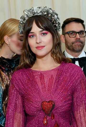 Dakota Johnson attends The 2019 Met Gala Celebrating Camp: Notes on Fashion at Metropolitan Museum of Art on May 06, 2019 in New York City. (Photo by Mike Coppola/MG19/Getty Images for The Met Museum/Vogue )