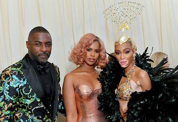 (L-R) Idris Elba, Sabrina Dhowre and Winnie Harlow attend The 2019 Met Gala Celebrating Camp: Notes on Fashion at Metropolitan Museum of Art on May 06, 2019 in New York City. (Photo by Mike Coppola/MG19/Getty Images for The Met Museum/Vogue )
