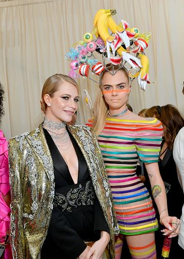 Poppy Delevingne and Cara Delevingne attend The 2019 Met Gala Celebrating Camp: Notes on Fashion at Metropolitan Museum of Art on May 06, 2019 in New York City. (Photo by Mike Coppola/MG19/Getty Images for The Met Museum/Vogue )