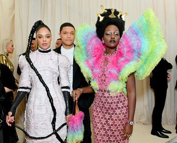 Tessa Thompson, Trevor Noah and Lupita Nyong'o attend The 2019 Met Gala Celebrating Camp: Notes on Fashion at Metropolitan Museum of Art on May 06, 2019 in New York City. (Photo by Mike Coppola/MG19/Getty Images for The Met Museum/Vogue )