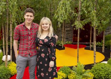 Derry Girls actors Nicola Coughlan and Dylan Llewellyn pictured at the Yesterday, “What If” show garden at this year’s Bloom Festival at the Phoenix Park in Dublin inspired by upcoming comedy “Yesterday”.  From director Danny Boyle and screenwriter Richard Curtis, and starring Lily James, Yesterday is in cinemas nationwide from June 28th. Photo: Anthony Woods