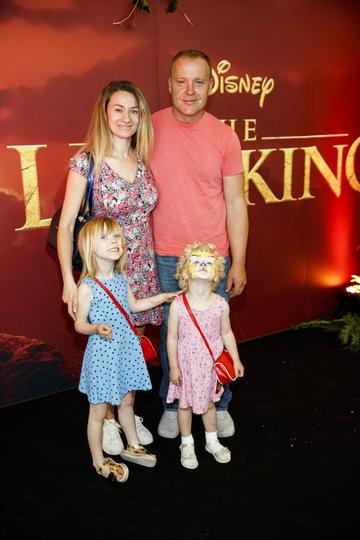 Claire O'Keefe and Patrick McAuley with Eeva (5) and Alba (3) at a special family screening of Disney’s THE LION KING at the Odeon Point Village. Picture: Andres Poveda