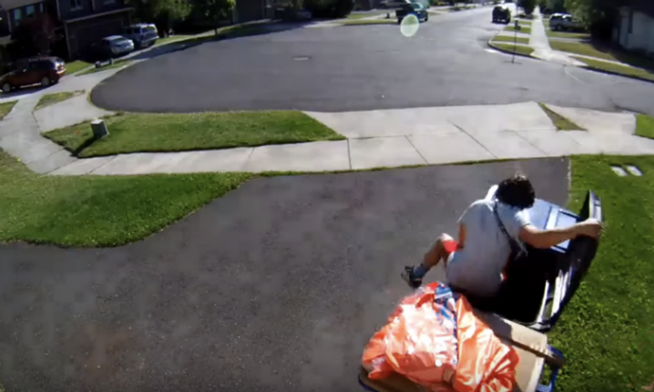 This security footage of a kid hiding from the cops in a wheelie bin ...