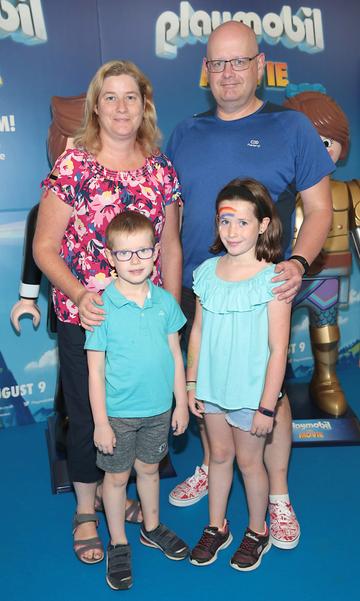 Donal Sullivan  and Annette Sullivan  with children Emily Sullivan and Eoghan Sullivan  at the special preview screening of Playmobil : The Movie. Photo: Brian McEvoy