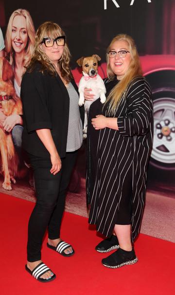 Dee Purcell and Mihaela Ivankenco with Bass  at the special preview screening of The Art of Racing in the Rain at the Odeon Cinema in Point Square,Dublin .
Pic Brian McEvoy Photography