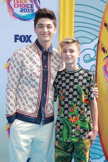 Asher Angel (L) and Avi Angel attend FOX's Teen Choice Awards 2019. (Photo by Rich Fury/Getty Images)