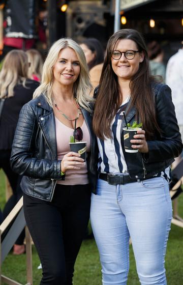 Jules Mahon and Erica Hudson at the Schweppes #UltimateMixer Sessions at The Big Grill festival in Herbert Park, Dublin, where guests sipped on expertly crafted cocktails and enjoyed live music mixes from Irish bands and DJs. Picture: Andres Poveda