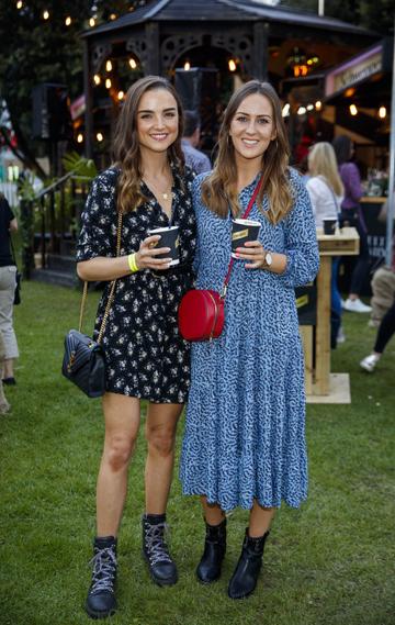 Niamh O'Sullivan and Sadhbh Higgins at the Schweppes #UltimateMixer Sessions at The Big Grill festival in Herbert Park, Dublin, where guests sipped on expertly crafted cocktails and enjoyed live music mixes from Irish bands and DJs. Picture: Andres Poveda