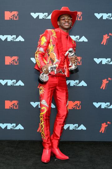 Lil Nas X poses with awards in the Press Room during the 2019 MTV Video Music Awards at Prudential Center on August 26, 2019 in Newark, New Jersey. (Photo by Roy Rochlin/Getty Images for MTV)