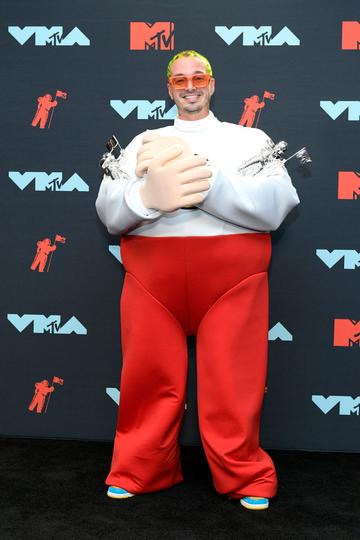 J Balvin poses with awards in the Press Room during the 2019 MTV Video Music Awards at Prudential Center on August 26, 2019 in Newark, New Jersey. (Photo by Roy Rochlin/Getty Images for MTV)
