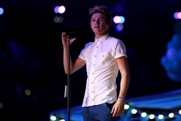 LONDON, ENGLAND - AUGUST 12:  Niall Horan of One Direction performs during the Closing Ceremony on Day 16 of the London 2012 Olympic Games at Olympic Stadium on August 12, 2012 in London, England.  (Photo by Hannah Peters/Getty Images)