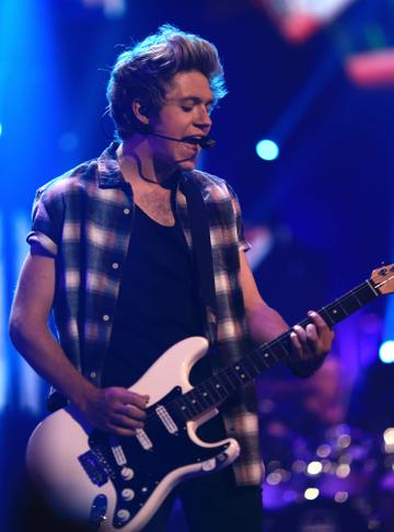 LAS VEGAS, NV - SEPTEMBER 20:  Singer Niall Horan of One Direction performs onstage during the 2014 iHeartRadio Music Festival at the MGM Grand Garden Arena on September 20, 2014 in Las Vegas, Nevada.  (Photo by Christopher Polk/Getty Images for iHeartMedia)