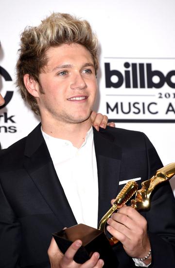 LAS VEGAS, NV - MAY 17:  Singer Niall Horan of One Direction, winners of the Top Duo/Group and Top Touring Artist awards, poses in the press room during the 2015 Billboard Music Awards at MGM Grand Garden Arena on May 17, 2015 in Las Vegas, Nevada.  (Photo by Jason Merritt/Getty Images)
