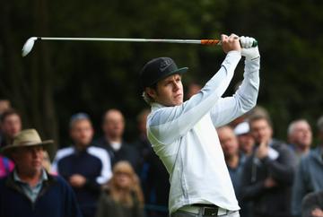 VIRGINIA WATER, ENGLAND - MAY 20:  Niall Horan of One Direction hits a shot during the Pro-Am ahead of the BMW PGA Championship at Wentworth on May 20, 2015 in Virginia Water, England.  (Photo by Ian Walton/Getty Images)