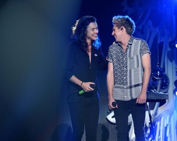LOS ANGELES, CA - DECEMBER 04:  Recording artists Harry Styles (L) and Niall Horan of One Direction perform onstage during 102.7 KIIS FMs Jingle Ball 2015 Presented by Capital One at STAPLES CENTER on December 4, 2015 in Los Angeles, California.  (Photo by Kevin Winter/Getty Images for iHeartMedia)