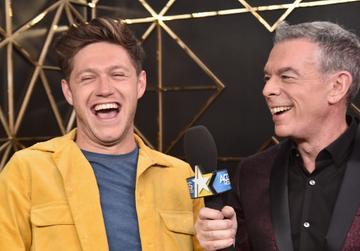 INGLEWOOD, CA - DECEMBER 01:  (EDITORIAL USE ONLY. NO COMMERCIAL USE) Niall Horan (L) and Elvis Duran in the press room during 102.7 KIIS FM's Jingle Ball 2017 presented by Capital One at The Forum on December 1, 2017 in Inglewood, California.  (Photo by Alberto E. Rodriguez/Getty Images for iHeartMedia)