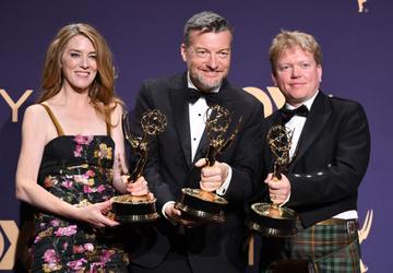 Annabel Jones (L), Charlie Brooker (C) and Russell McLean (R) pose with the Emmy for Outstanding Television Movie "Bandersnatch" during the 71st Emmy Awards at the Microsoft Theatre in Los Angeles on September 22, 2019. (Photo by Robyn Beck/Getty Images)
