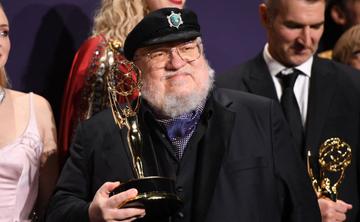 US novelist George R. R. Martin poses with the Emmy for Outstanding Drama Series "Game Of Thrones" during the 71st Emmy Awards at the Microsoft Theatre in Los Angeles on September 22, 2019. (Photo by Robyn Beck/Getty Images)