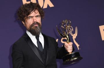 US actor Peter Dinklage poses with the Emmy for Outstanding Supporting Actor in a Drama Series for "Game of Thrones" during the 71st Emmy Awards at the Microsoft Theatre in Los Angeles on September 22, 2019. (Photo by Robyn Beck/Getty Images)