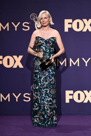 Michelle Williams poses with awards for Outstanding Lead Actress in a Limited Series or Moviein the press room during the 71st Emmy Awards at Microsoft Theater on September 22, 2019 in Los Angeles, California. (Photo by Frazer Harrison/Getty Images)