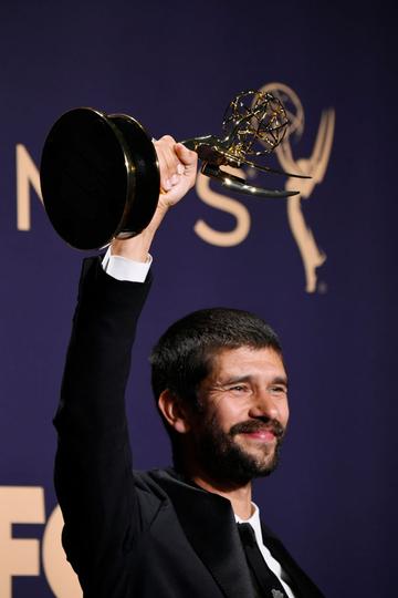 Ben Whishaw poses with award for Outstanding Supporting Actor in a Limited Series or Movie in the press room during the 71st Emmy Awards at Microsoft Theater on September 22, 2019 in Los Angeles, California. (Photo by Frazer Harrison/Getty Images)