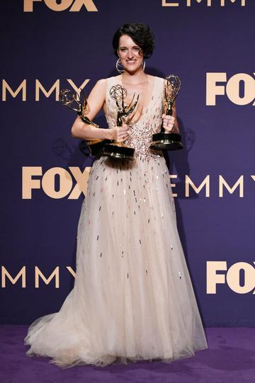Phoebe Waller-Bridge poses with awards for Outstanding Comedy Series, Outstanding Lead Actress in a Comedy Series, and Outstanding Directing for a Comedy Series in the press room during the 71st Emmy Awards at Microsoft Theater on September 22, 2019 in Los Angeles, California. (Photo by Frazer Harrison/Getty Images)
