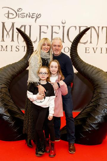 Kim McKenzie-Doyle, Fergal Doyle, Bebhinn (6) and Blaire (9) pictured at the special family preview screening of Disney’s MALEFICENT: MISTRESS OF EVIL, in the Odeon Point Village. Picture Andres Poveda