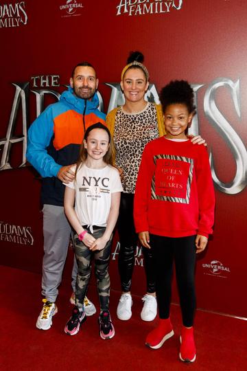 Tom Mahady with Claire Woods, Sienaa Woods (8) and Medison Meeting (10) pictured at a special preview screening of The Addams Family at the Light House Cinema, Dublin.  Picture: Andres Poveda
